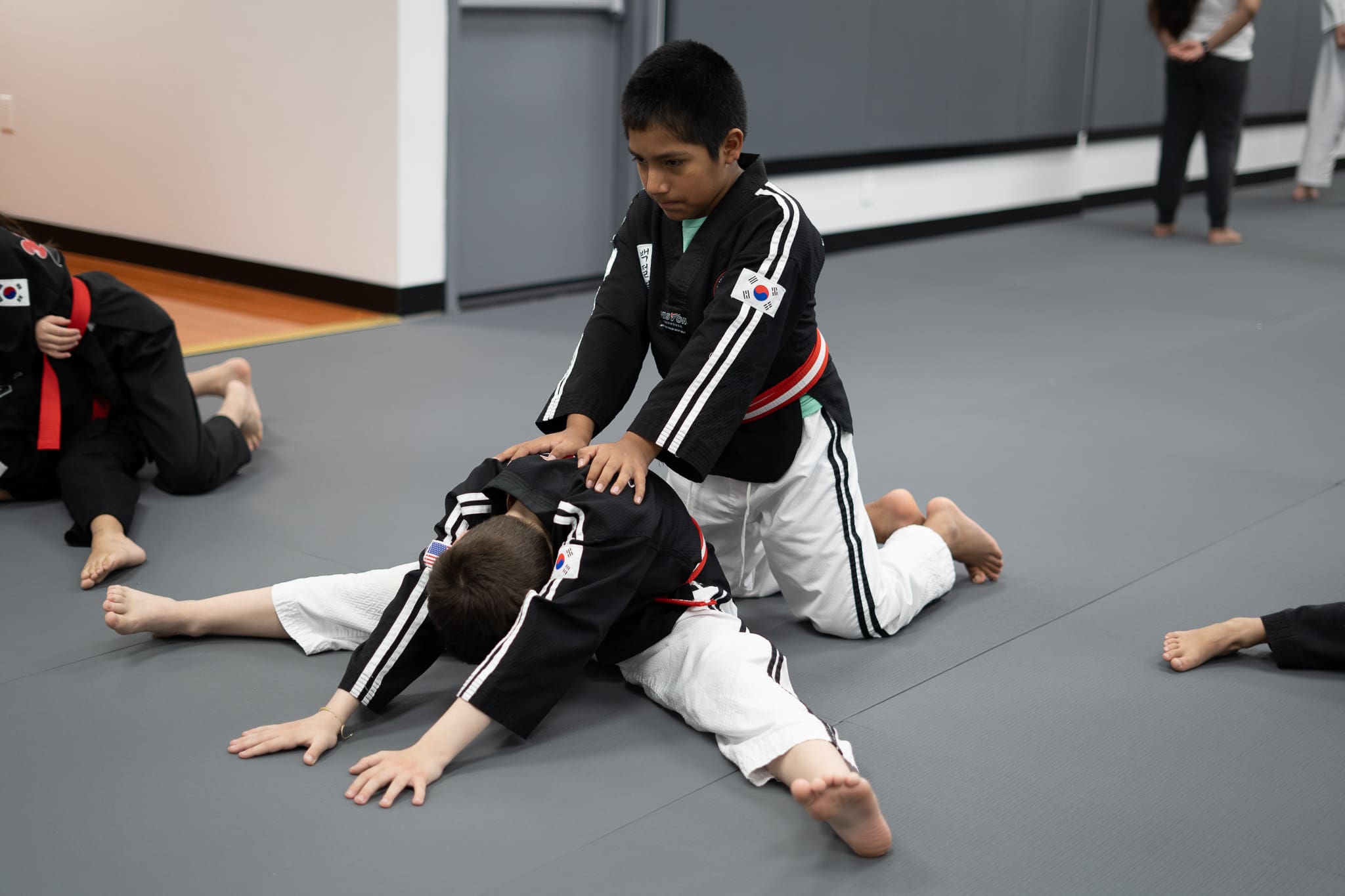 teaching self defense strategies goes beyond the studio. kids will learn how to respond appropriately to a dangerous situation and resolve conflict in the first place before any self defense skills are used. this will make kids more aware of bullying and turn a bad situation better with positive attitude