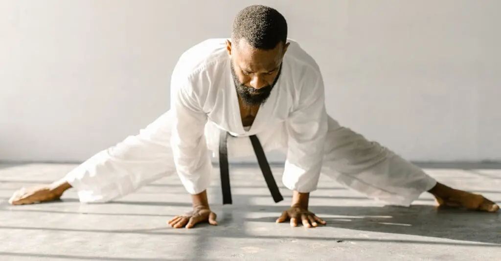 Adult martial artist improving flexibility during beginner martial arts training for adults