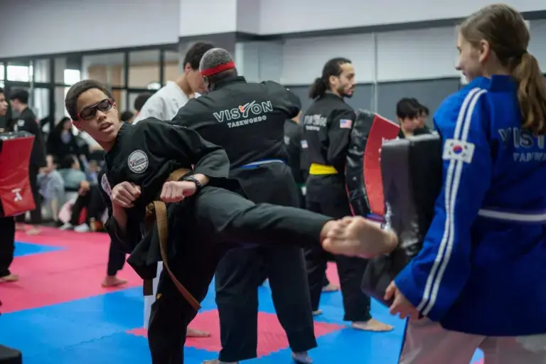 group of students doing drill for martial arts lessons